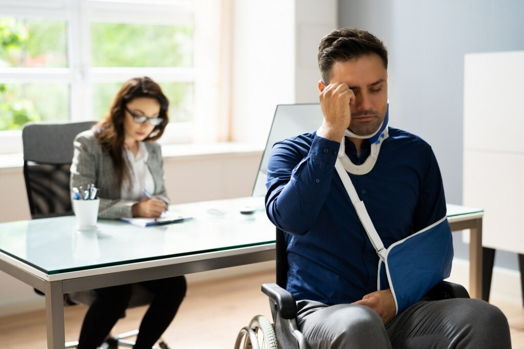 Injured man with his attorney