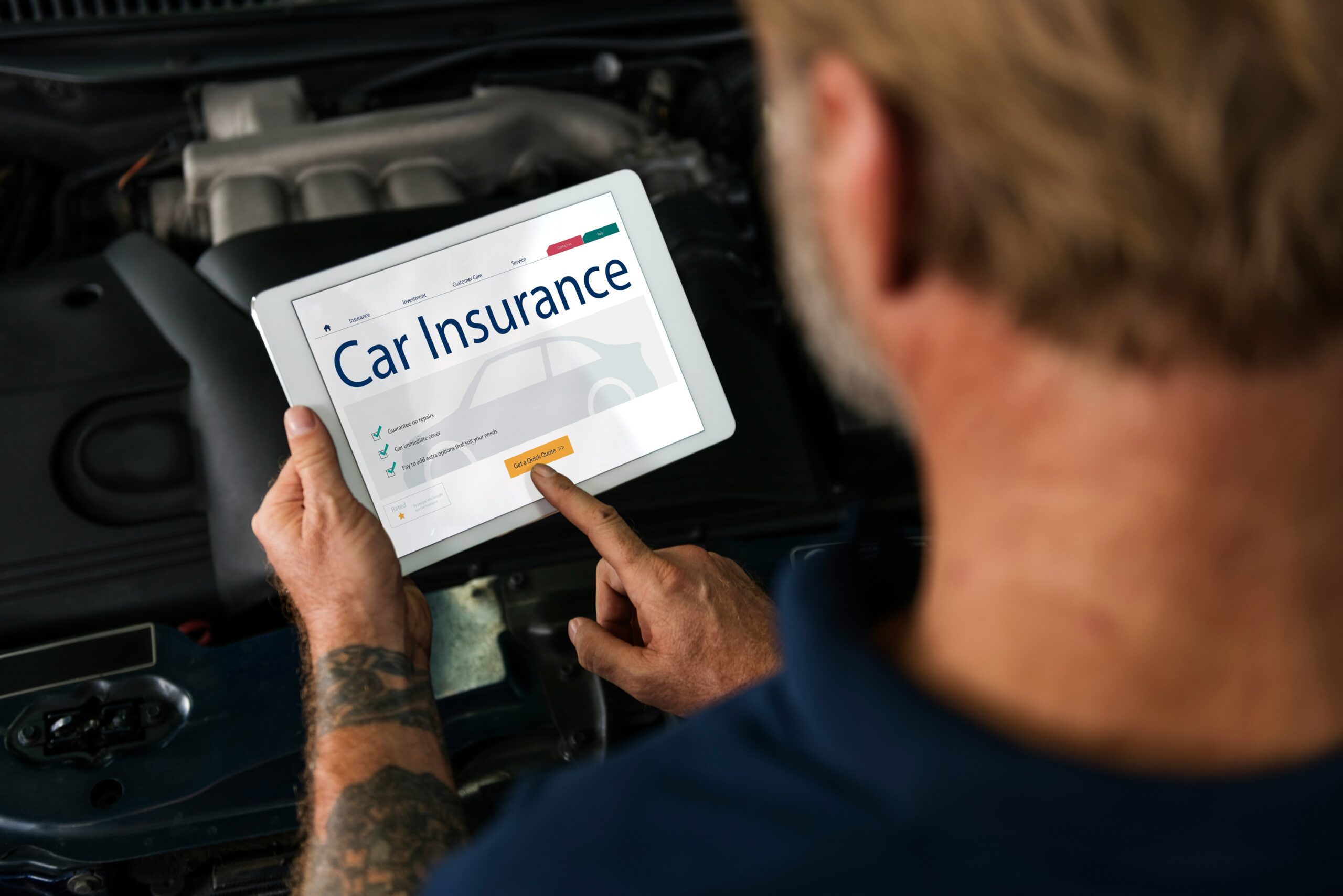 Car insurance information displayed on a tablet screen, showcasing a digital interface for policy management.